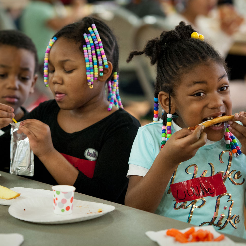 photo of girls eating lunch